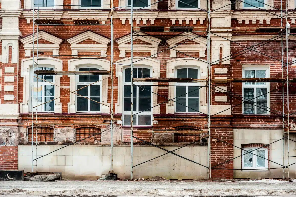 Restoration,Of,Old,Building,With,White,Windows,And,Red,Blocks